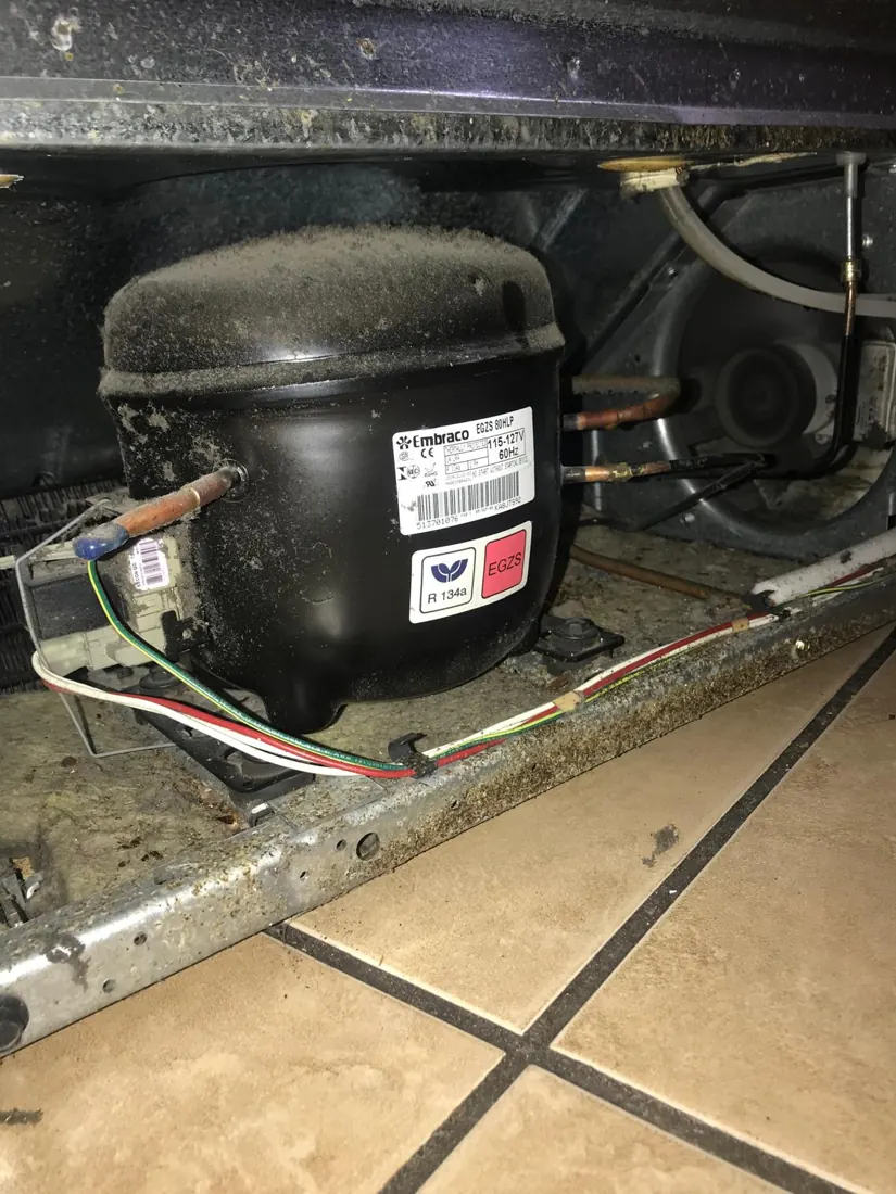 Refrigerator compressor compartment