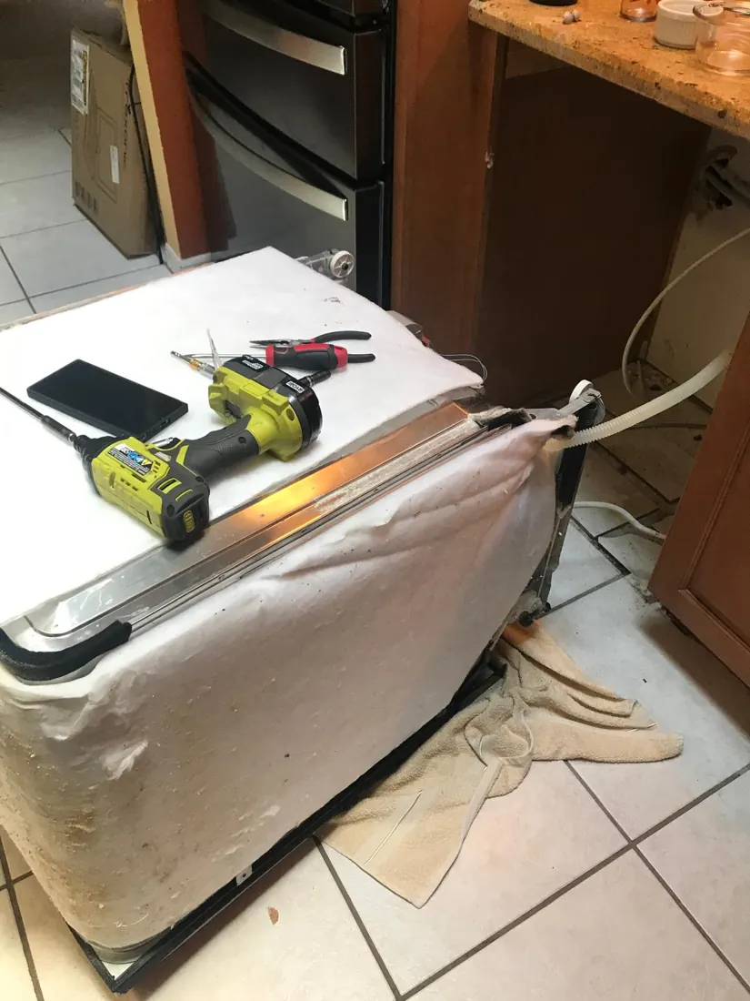 Dishwasher pulled out for service