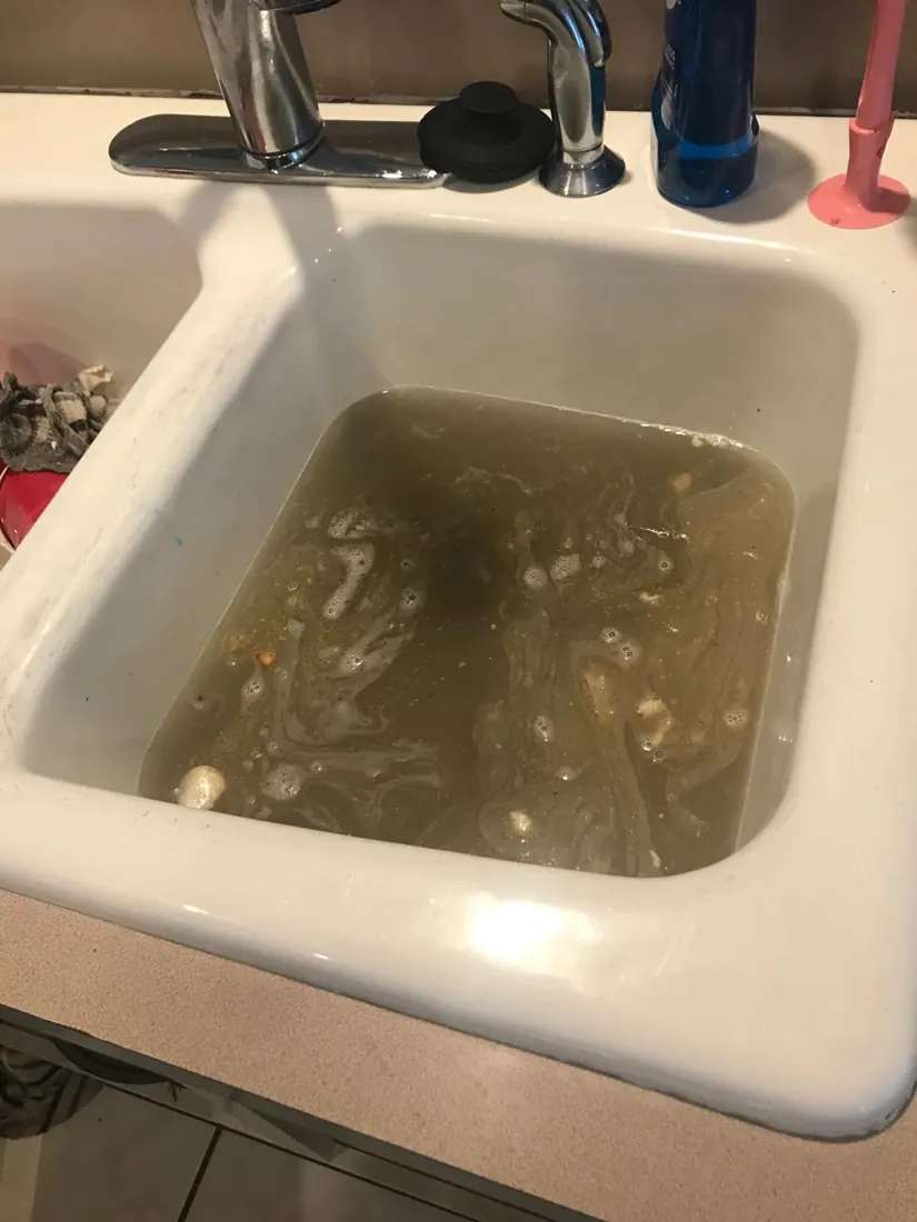 Kitchen sink drainage during a service visit