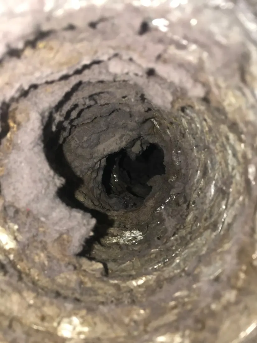 Vent buildup inspected during service