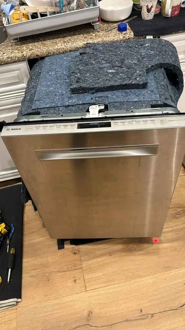 Dishwasher at a service visit